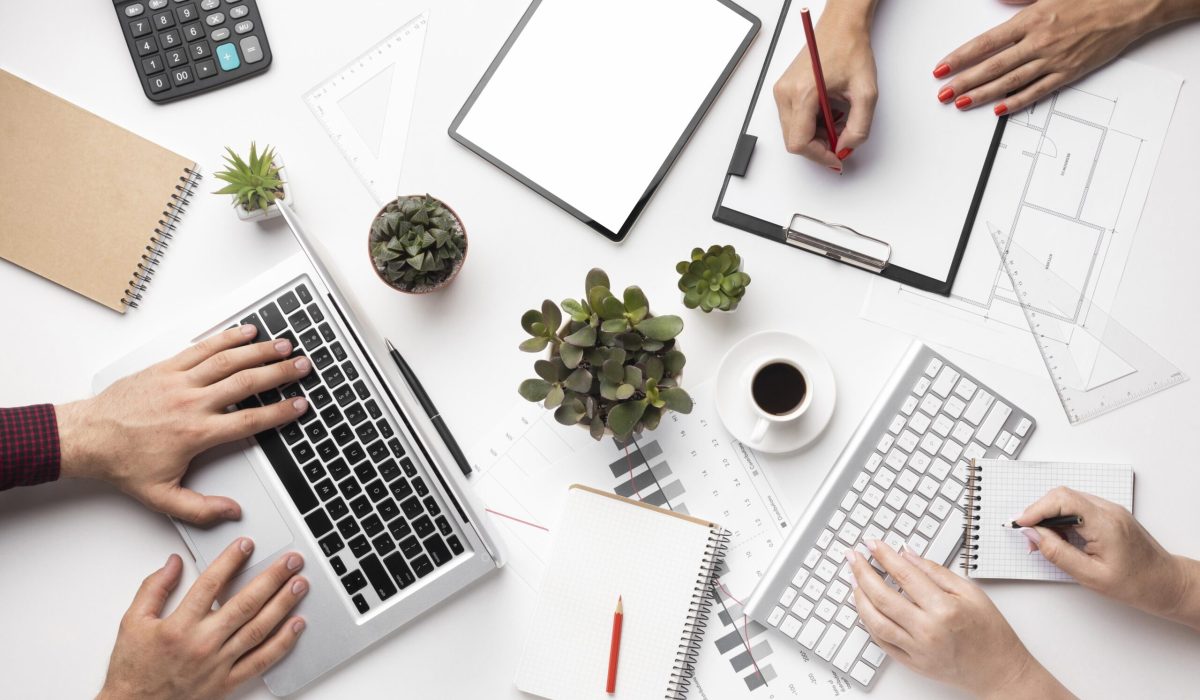 flat-lay-office-desk-assortment-with-empty-screen-tablet