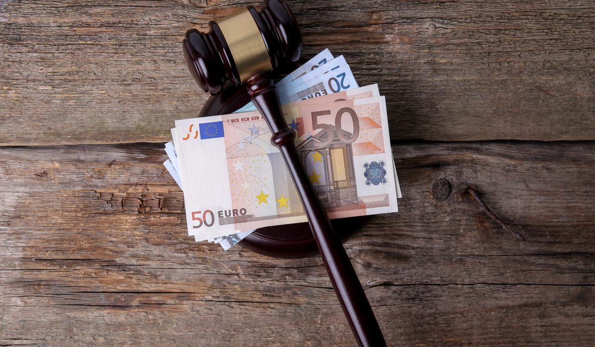 Judge hammer on the wooden table